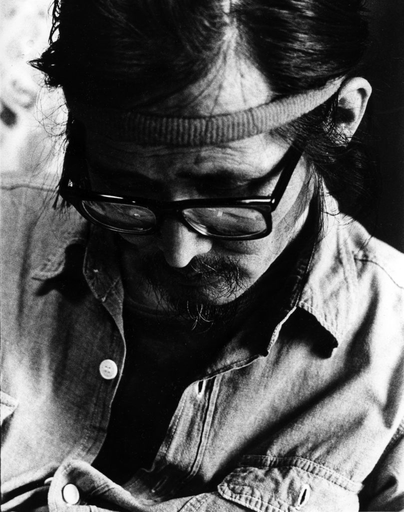 Black and white portrait of artist Takuma Nakahira