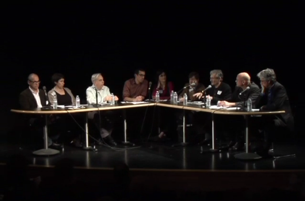Panelists sitting onstage during the Is Photography Over symposium