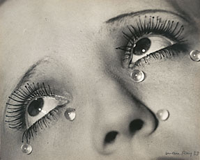 close up woman's eyes with five tear drops