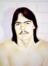 portrait of shirtless man with mustache and long hair in bathroom
