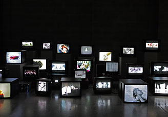 Gordon, installation shot of 22 films on monitors 