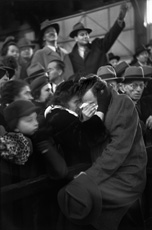 Cartier-Bresson, photo of man and woman embracing in crowd 