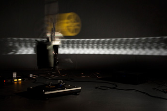 Mauricio Ancalmo, yellow film reel and light in motion
