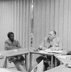 David Goldblatt, image of black and white man meeting at table