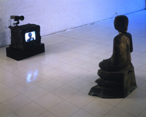 Nam June Paik, buddha sculpture facing television displaying buddha