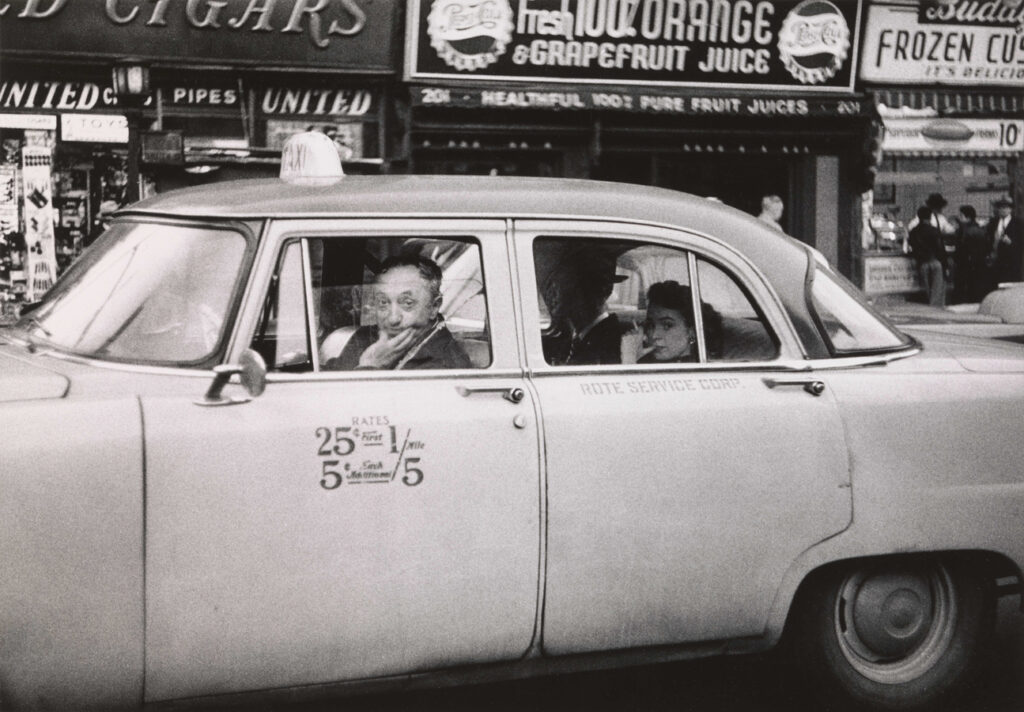 Black and white photograph of a taxicab