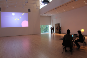 A white room with an image projected onto a wall