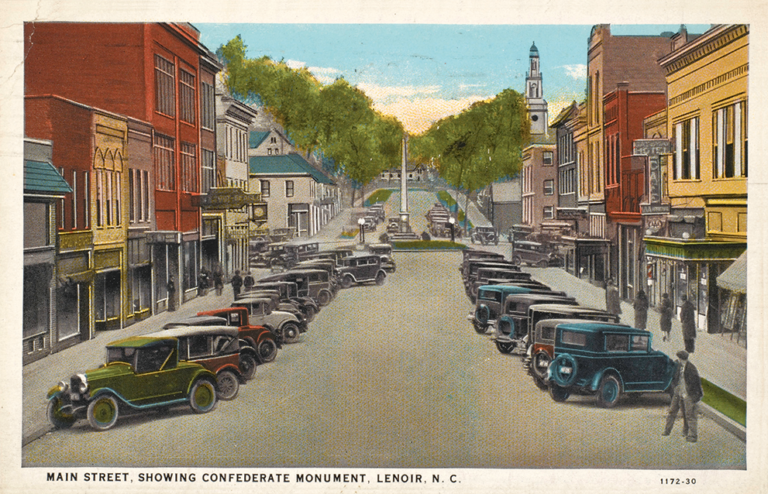A vintage color postcard of cars parked along a street reading "Main Street, Showing Confederate Monument, Lenoir, North Carolina"