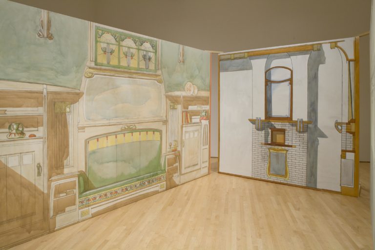 two wall-size paintings akin to theater sets depicting interior spaces