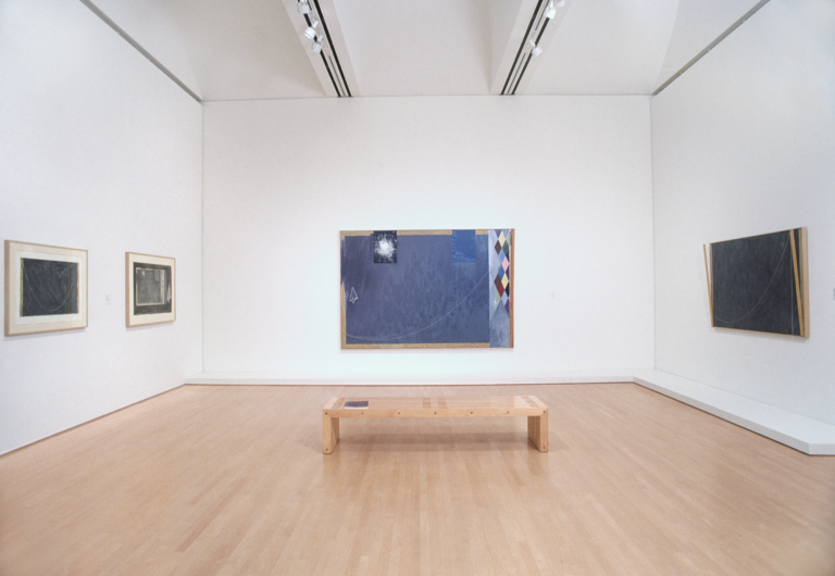 A room with four works by Jasper Johns