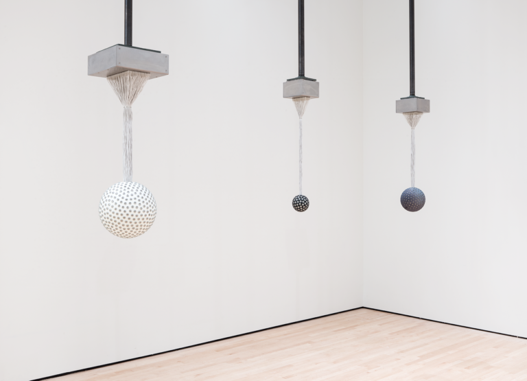 Three spheres are suspended from the ceiling by wires, Lozano_Hemmer, Soundtracks