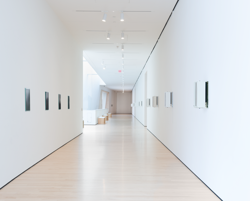 A white gallery hallway with speakers mounted on the wall, Philipsz, Soundtracks