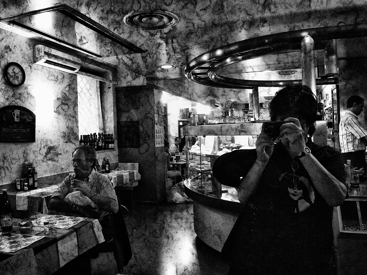 Black and white photograph of a person taking a photograph reflected in a mirror, Moriyama