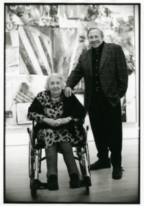 Black and white portrait of an elderly Caucasian woman in a wheel chair next to a standing Caucasian man, Wattis and Rauschenberg