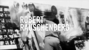 The words "Robert Rauschenberg" over black-and-white archival footage of artist Robert Rauschenberg at work in his studio