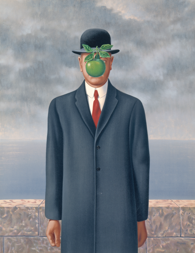 A man in a bowler hat standing in front of a cloudy sky with a green apple covering his face