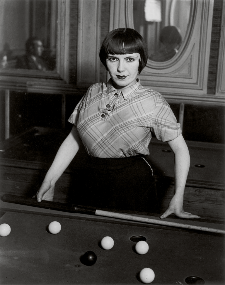Black and white photograph of a billiard player