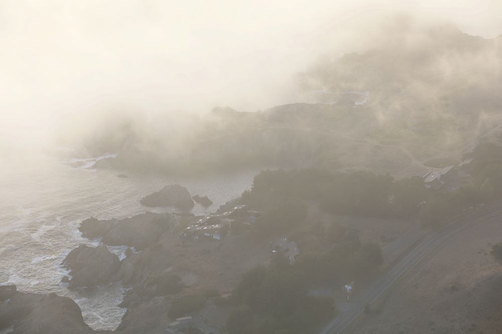 a bird's eye view of sea ranch with fog