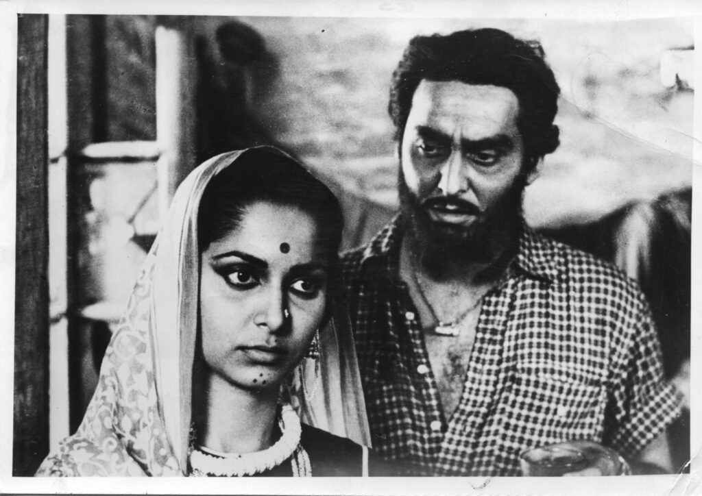 Black and white still of a man and woman
