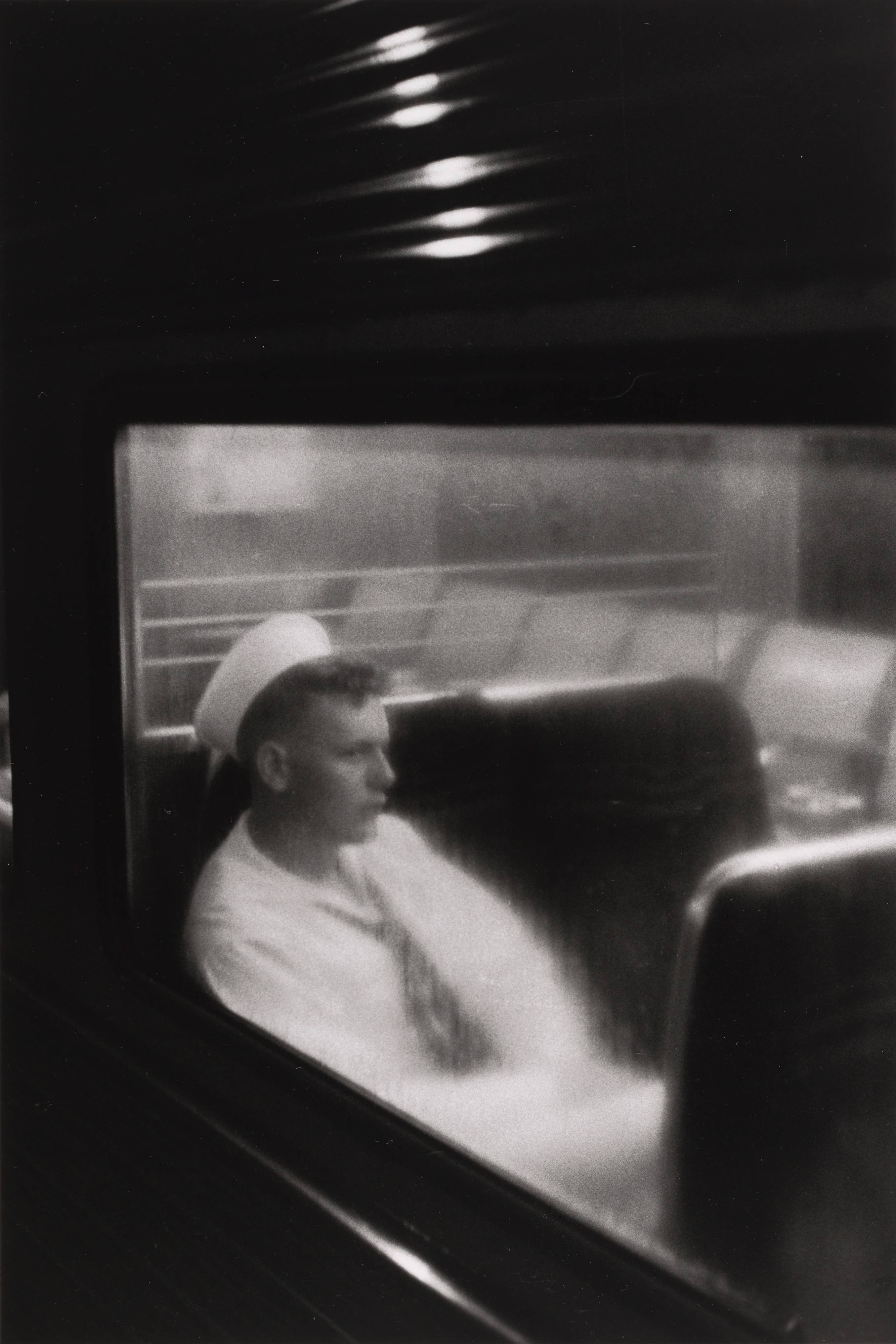 Louis Stettner, Sailor in Train, Penn Station, New York, 1958 · SFMOMA