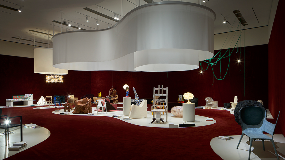 Installation view of the exhibition Conversation Pieces, featuring works of furniture, including various chair designs.