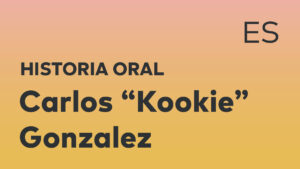 Thumbnail for Spanish oral history interview of Carlos "Kookie" Gonzalez with black title text over an ombré orange-yellow background.