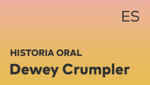 Thumbnail for Spanish oral history interview of Dewey Crumpler with black title text over an ombré orange-yellow background.